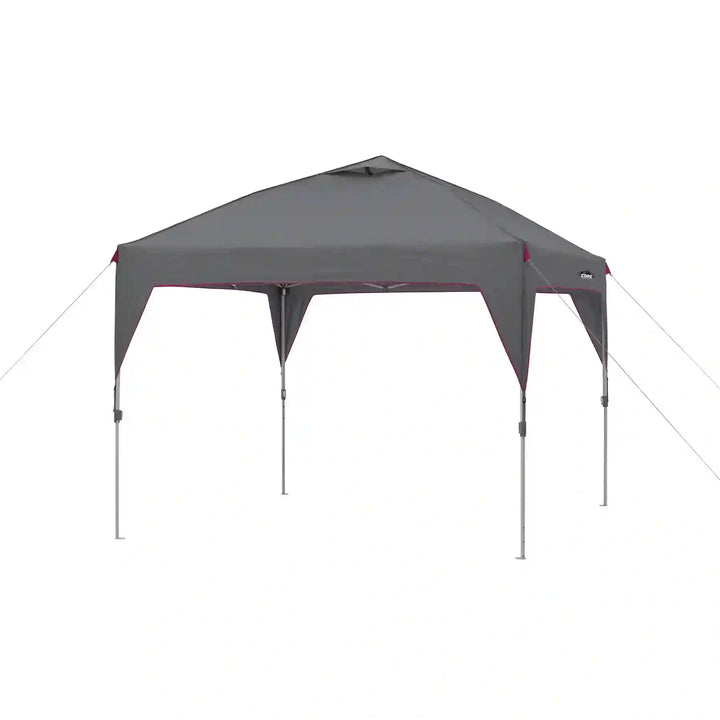  A large, orange and gray CORE 10' x 10' instant canopy, also known as a gazebo. The canopy has a pop-up design for quick and easy setup, and it provides shade and shelter for outdoor activities from outdoorlife.ae