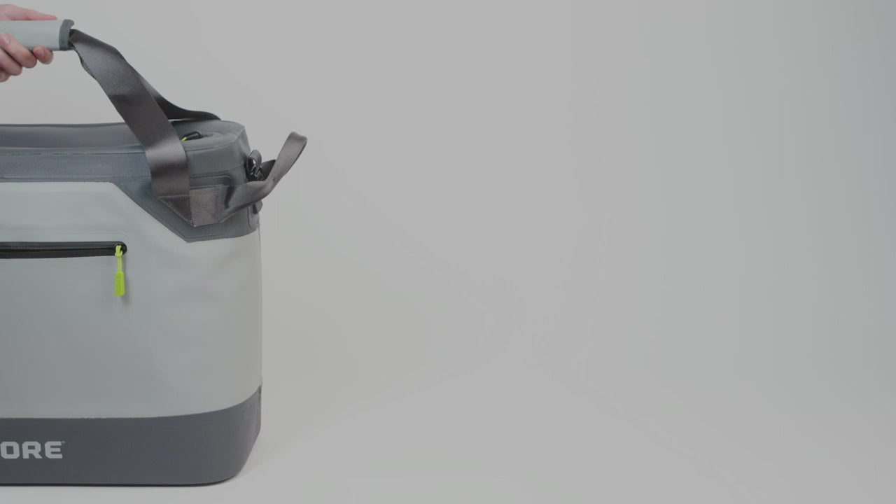 A blue CORE 10-liter soft cooler tote with a padded, insulated interior. The cooler is designed to hold up to 12 cans or other beverages and features a comfortable carrying handle.