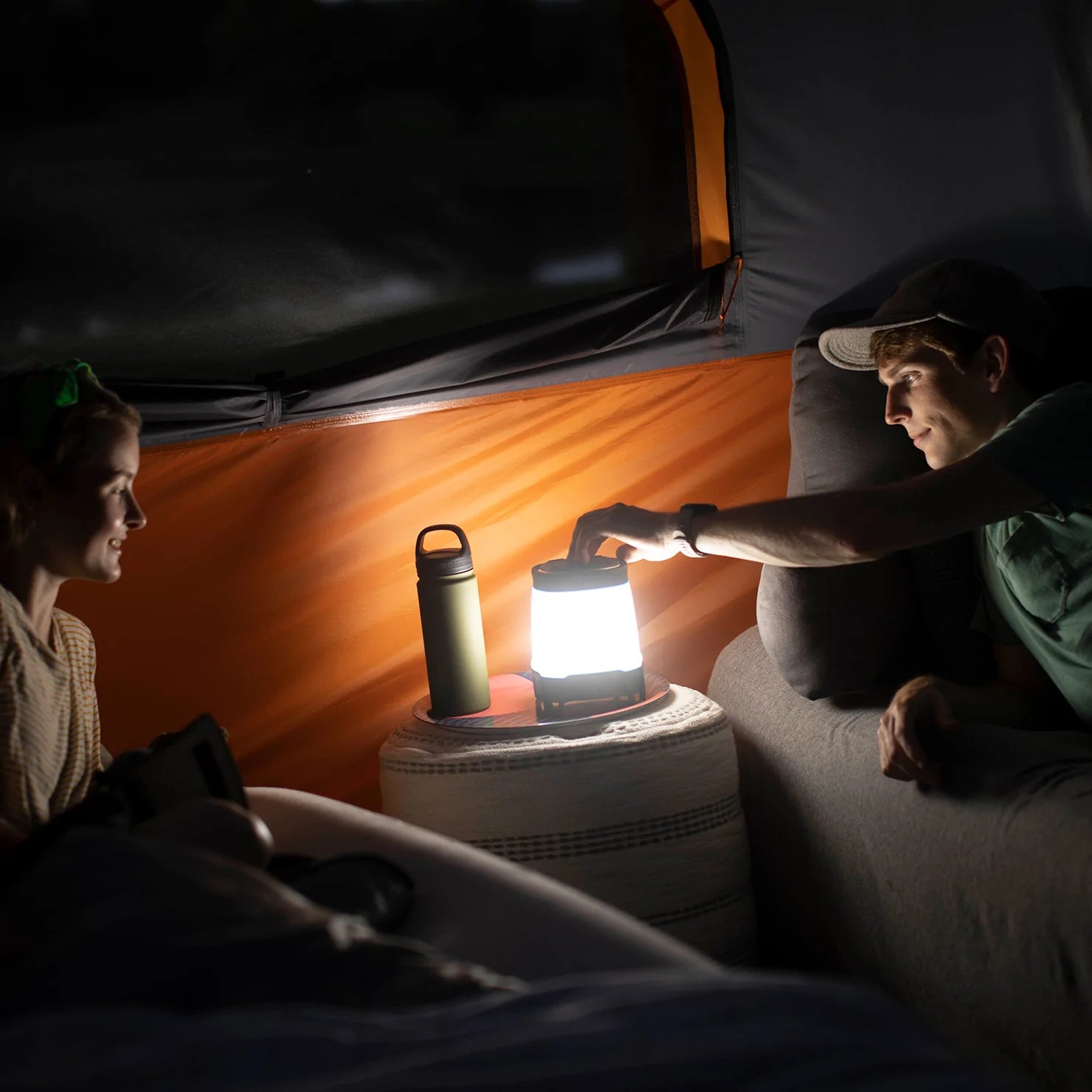 A portable, rechargeable CORE lantern with 1250 lumens of brightness and a built-in Bluetooth speaker. The lantern features multiple lighting modes, including high, low, and strobe, and it can be used as a hands-free speaker for playing music.
